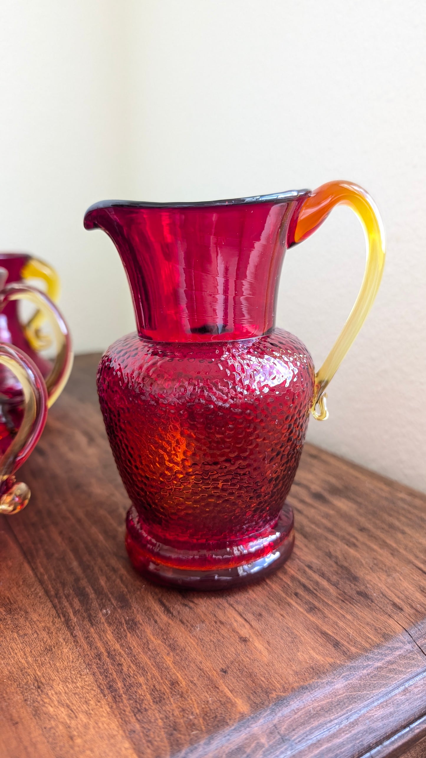 Collection of Red/ Amberina Crackle and Textured Art Glass Pitchers (set of 4)