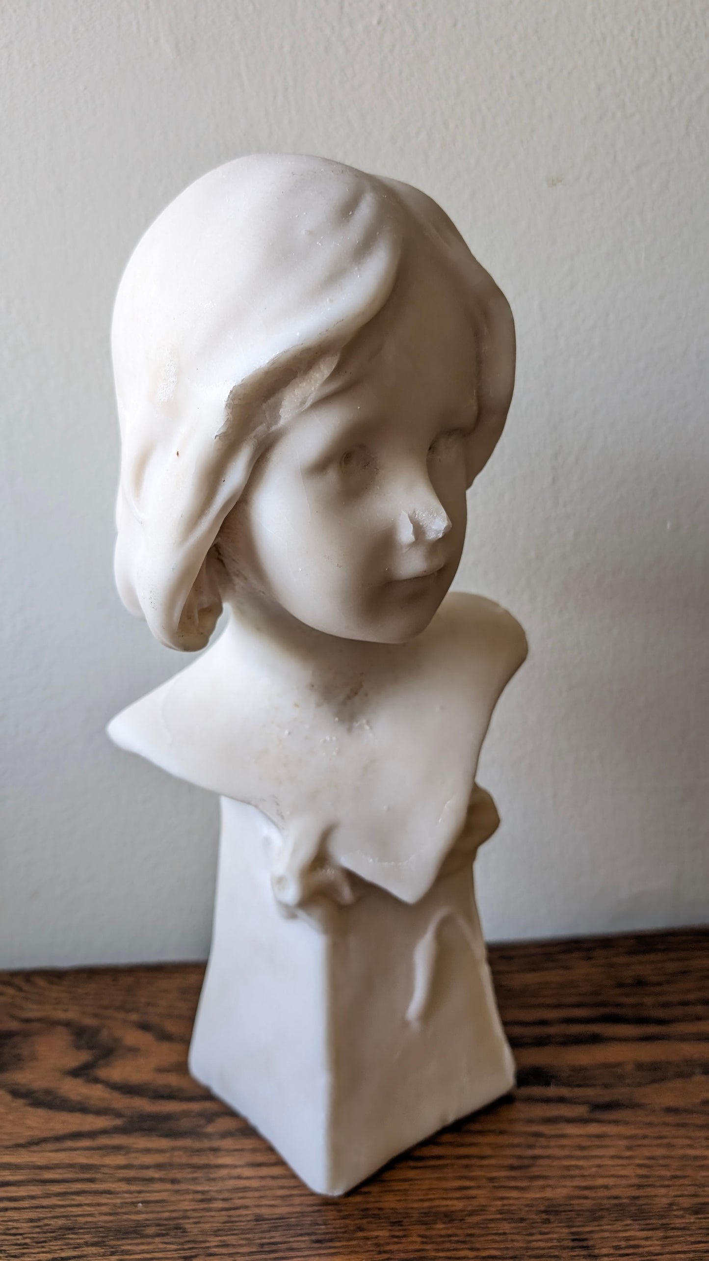 Marble bust of a young girl