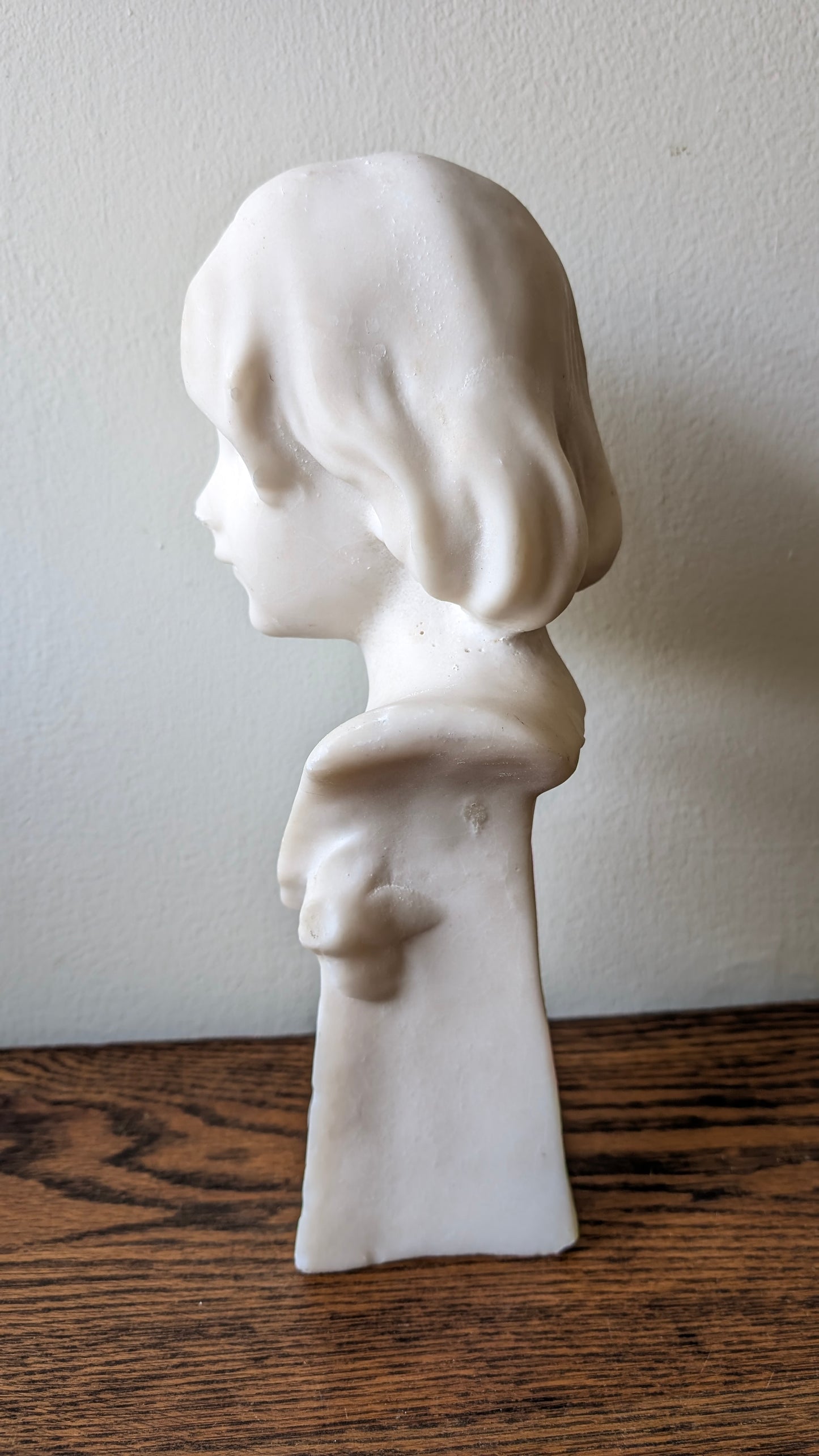 Marble bust of a young girl