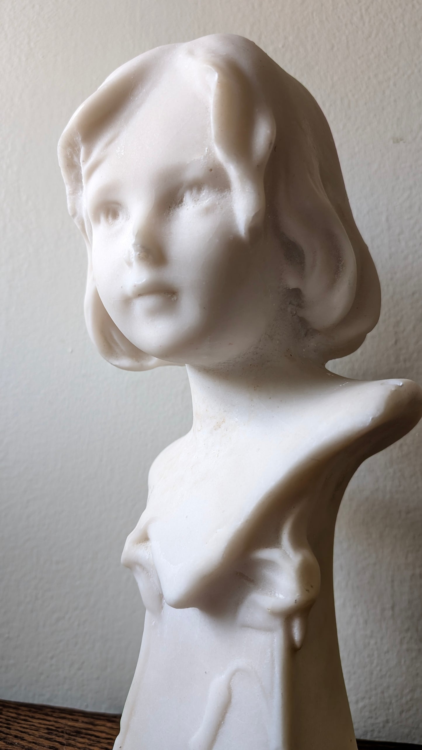 Marble bust of a young girl